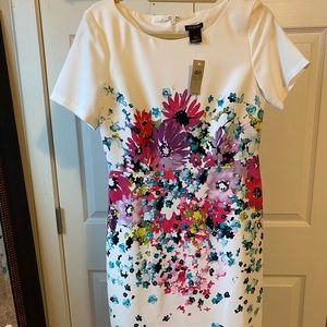 White fitted dress with floral detail